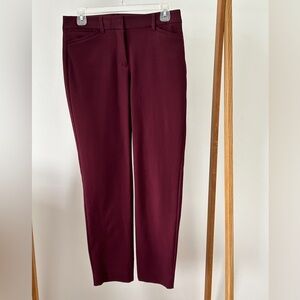 WHBM The Slim Ankle pant. Maroon in color.